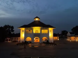 Landmark Tower Prints: Aerial drone view of Monument Gedung Juang is one of historical building in Tambun at night