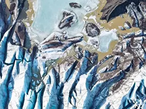 Aerial drone view of particular ice textures formed in the Svinafellsjokull glacier following global warming