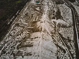 Emissions Prints: Aerial drone view phosphogypsum white mountains waste from factories
