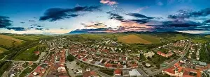 Hoar Prints: Aerial drone view of Podolinec, the town near Stara Lubovna, Slovakia, during sunset
