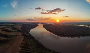 Bulk Prints: Aerial drone view of river landscape in sunny summer evening