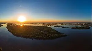 Bulk Prints: Aerial drone view of river landscape in sunny summer sunset