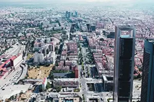 From above aerial drone view shot of city with dense infrastructure in Madrid, Spain