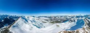 Stoos Prints: Aerial drone view of snow covered mountains and ski slopes, ski area Stoos, Switzerland