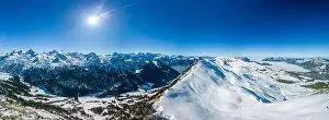 Stoos Prints: Aerial drone view of snow covered mountains and ski slopes, ski area Stoos, Switzerland