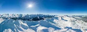Stoos Prints: Aerial drone view of snow covered mountains and ski slopes, ski area Stoos, Switzerland