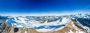 Aerial drone view of snow covered mountains and ski slopes, ski area Stoos, Switzerland