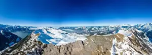 Stoos Prints: Aerial drone view of snow covered mountains and ski slopes, ski area Stoos, Switzerland