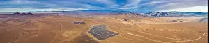 Aerial drone view of a Solar Energy Photovoltaic Power Plant over Atacama desert sands