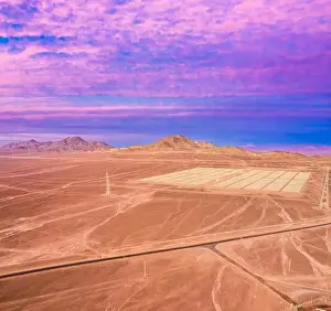 Solar Farm Prints: Aerial drone view of a Solar Energy Photovoltaic Power Plant over Atacama desert sands