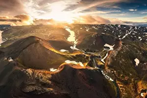 Aerial drone view of sunset over mysterious volcanic crater