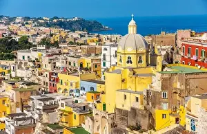Alleyways Prints: Aerial drone view of vibrantly colorful houses of Marina Corricella in sunny summer weather at Procida island