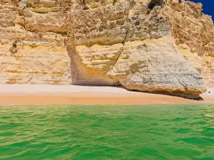 Aerial drone views of Praia da Marinha and Malhada do Baraco - beaches in Algarve, Portugal