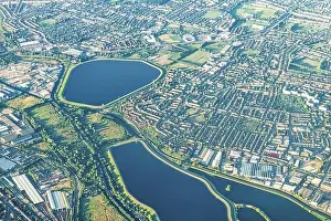 Aerial high angle above bird's eye drone view from airplane over east city of London in United Kingdom with terraced