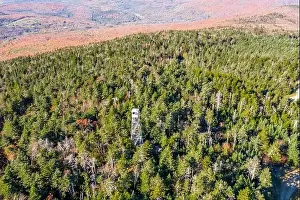 Distant Land Prints: aerial of image of Okemo Mountain in the Fall and a lone fire tower Ludlow, Vermont