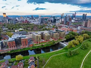 Aerial image taken above the river Irwell in Salford showing Manchester and Salford skyline
