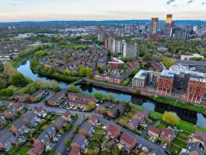 Salford Prints: Aerial image taken above the river Irwell in Salford showing Manchester and Salford skyline