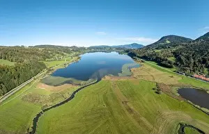 Aerial landscape in the Allgaeu Alps with lake Alpsee next to Immenstadt, Bavaria, Germany