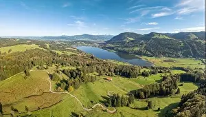 Curvy Road Prints: Aerial landscape in the Allgaeu Alps with lake Alpsee next to Immenstadt, Bavaria, Germany