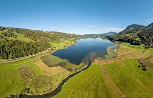 Aerial landscape in the Allgaeu Alps with lake Alpsee next to Immenstadt, Bavaria, Germany