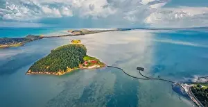 Aerial landscape photography. Aamzing morning view of St Mary's Monastery and wooden pier
