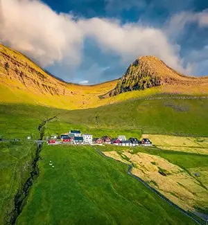 Faroe Island Prints: Aerial landscape photography. Bright summer view of Sydradalur village