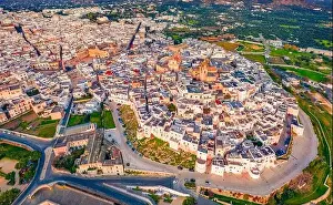 Ostuni Prints: Aerial landscape photography. Colorful spring view from flying drone of Ostuni town