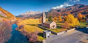 Fascination Prints: Aerial landscape photography. Colorful view from flying drone of San Lurench church in Sils im Engadin village