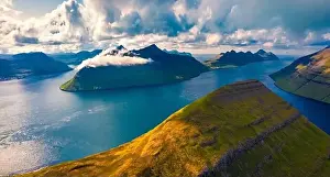 Klaksvik Prints: Aerial landscape photography. Dramatic evening view from flying drone Kalsoy island