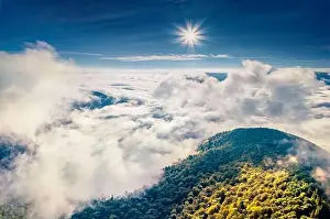 Sun Ray Prints: Aerial landscape photography. Foggy morning view from flying drone of mountain forest