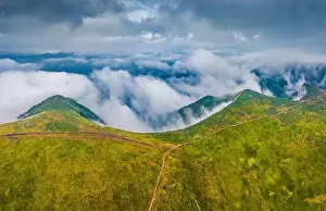 Majestic Mountain Prints: Aerial landscape photography. Foggy summer scene of Svydovets mountain range with old country road