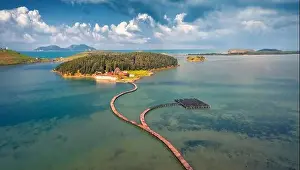 Majestic Mountain Prints: Aerial landscape photography. Picturesque morning view of St Mary's Monastery and wooden pier