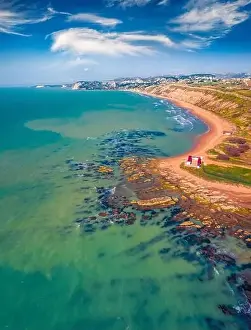 Aerial landscape photography. Sunny spring view from flying drone of Giallonardo Beach