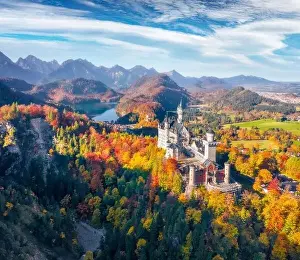 Aerial landscape photography. View from flying drone popular tourist destination - Neuschwanstein Castle