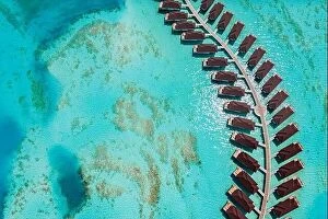 Images Dated 3rd November 2019: Aerial landscape with tropical resort villas, bungalow, palm trees and amazing sea shore