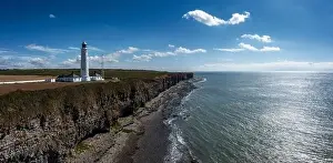 Rocky Beach Prints: aerial landscape view of the Nash Point Lighthouse and Monknash Coast in South Wales