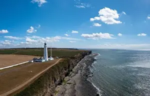 Rocky Beach Prints: aerial landscape view of the Nash Point Lighthouse and Monknash Coast in South Wales
