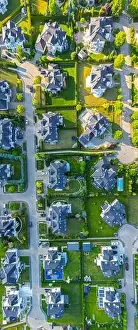 Aerial of new construction luxury residential neighborhood street single family homes real estate