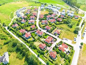 New Construction Prints: Aerial of new construction luxury residential neighborhood street single family homes real estate