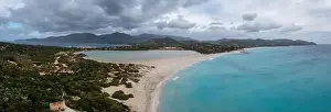Aerial panorama of Capo Carbonara and the beach and lake near Villasimius in southeastern Sardinia