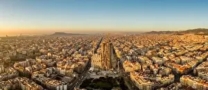 Agbar Tower Prints: Aerial panorama drone shot of Barcelona city center in sunrise golden hour in Spain winter