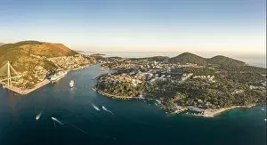 Dalmatian Coast Prints: Aerial panorama drone shot of Dubrovnik bridge at Port Gruz in Lapad Adriatic sea in Croatia summer sunset