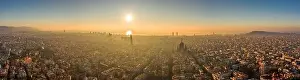 Agbar Tower Prints: Aerial panorama drone shot of skyline in Barcelona center in misty morning foggy sunrise golden glow in Spain winter