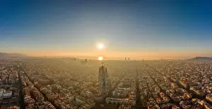 Agbar Tower Prints: Aerial panorama drone shot of skyline in Barcelona city center in foggy sunrise golden hour in Spain winter