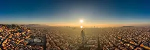 Agbar Tower Prints: Aerial panorama drone shot of skyline in Barcelona city center in foggy sunrise golden hour in Spain winter