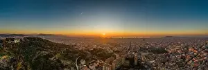 Agbar Tower Prints: Aerial panorama drone shot of sunrise over sea horizon of Barcelona city in Spain winter dawn