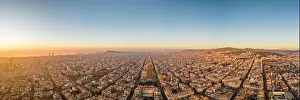 Agbar Tower Prints: Aerial panorama drone shot of sunrise over sea horizon of Barcelona city in Spain winter dawn