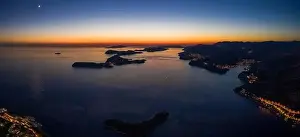 Dalmatian Coast Prints: Aerial panorama drone shot of sunset horizon in Adriatic islands in Dubrovnik in Croatia summer