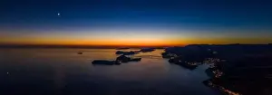 Dalmatian Coast Prints: Aerial panorama drone shot of sunset horizon in Adriatic islands in Dubrovnik in Croatia summer