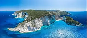 Noon Prints: Aerial panorama drone shot of Zakynthos north end with Navagio beach and yachts in Ionian sea